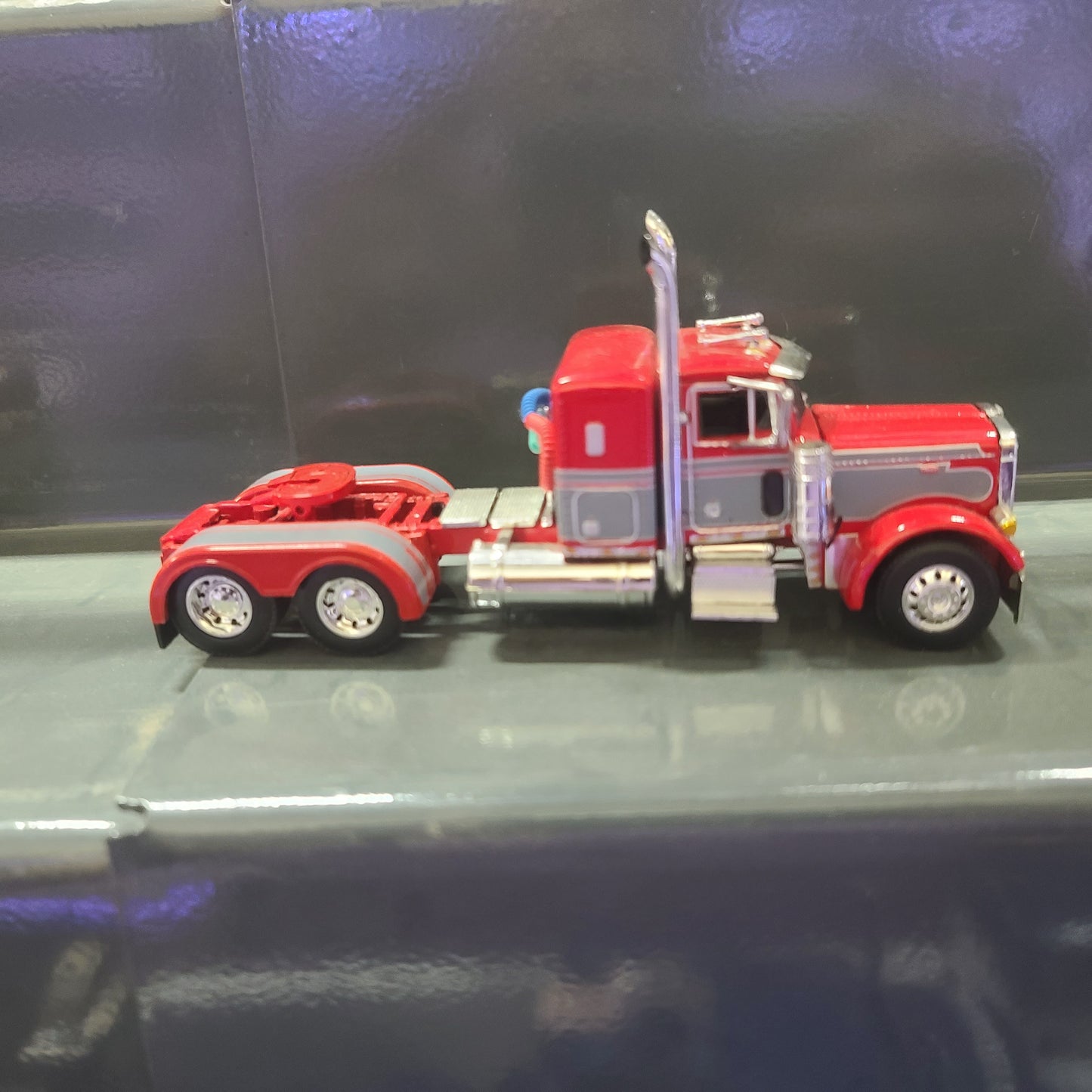 1:64 DCP Cab Only Peterbilt 379 36" bunk, red, gray and white