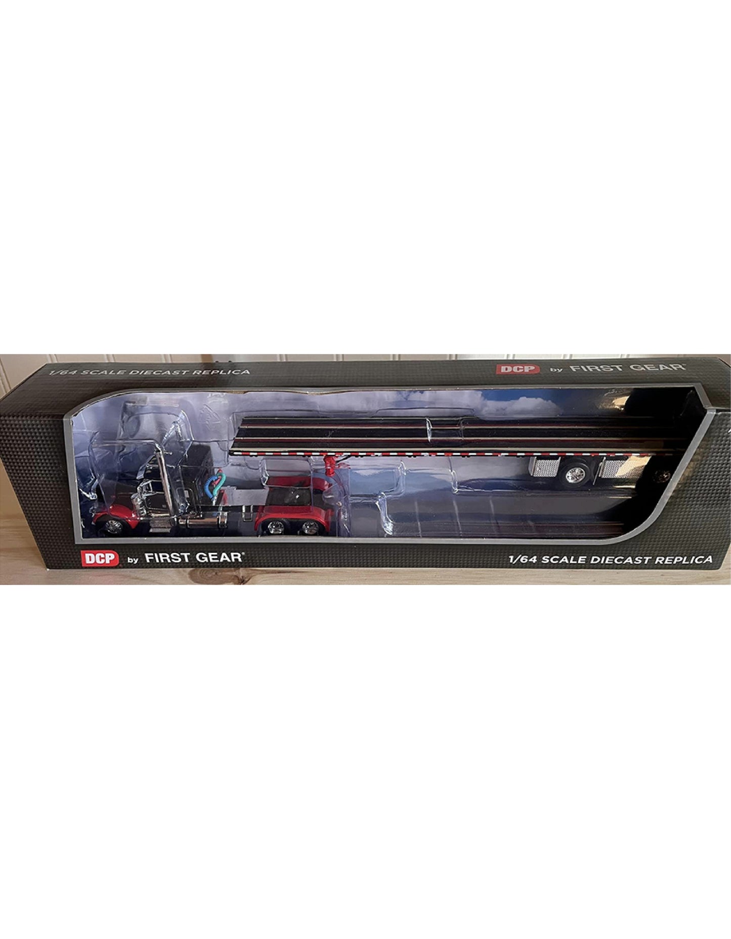 1:64 DCP Peterbilt 379 36" Flattop sleeper with Wilson spread axle flatbed
