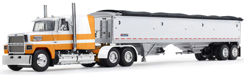 1:64 DCP Ford LTL 9000 Semi Truck with 60 Flat Top Sleeper in Orange and White with Wilson Pacesetter Grain Trailer