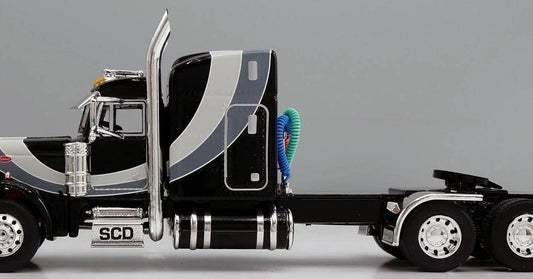 1:64 DCP Black Gray and Silver Peterbilt 379 with Wilson Spread Axle Cattle Trailer SCD