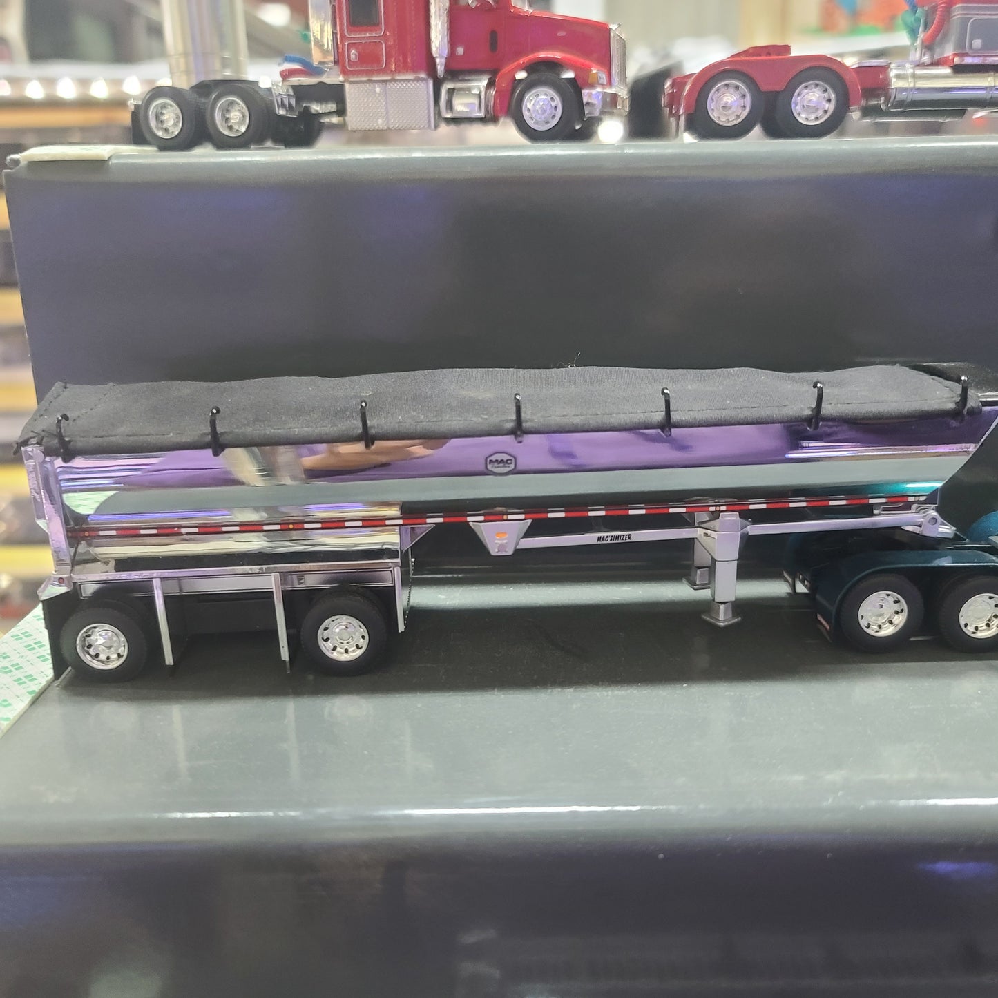 1:64 DCP Trailer Only MAC round end dump spread, chrome