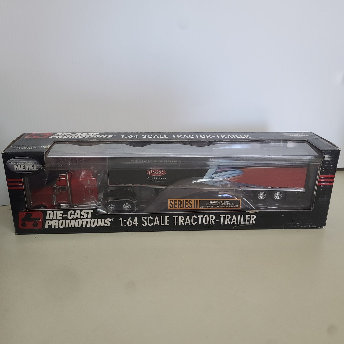 1:64 DCP Red Peterbilt 379 Stand up bunk with a 53' Dry van Series II Class Pays
