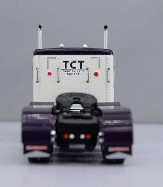 1:64 DCP W900L with 60" flat top sleeper and Polar deep drop tank trailer (Purple)