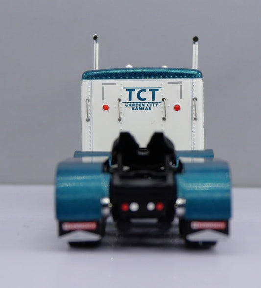 1:64 DCP W900L with 60" flat top sleeper Teal (truck only)