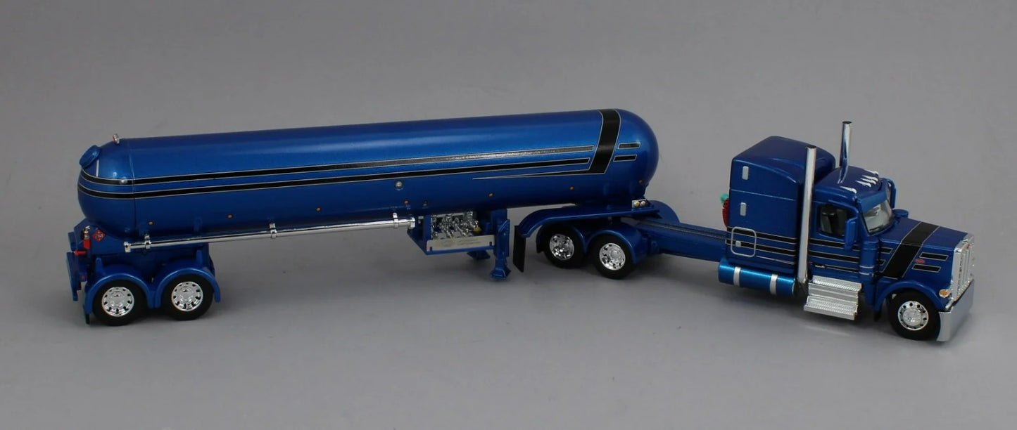 1:64 DCP blue and black Peterbilt 589 70" Midroof w/ Mississippi LP tanker