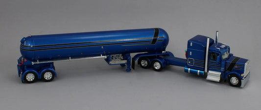 1:64 DCP blue and black Peterbilt 589 70" Midroof w/ Mississippi LP tanker