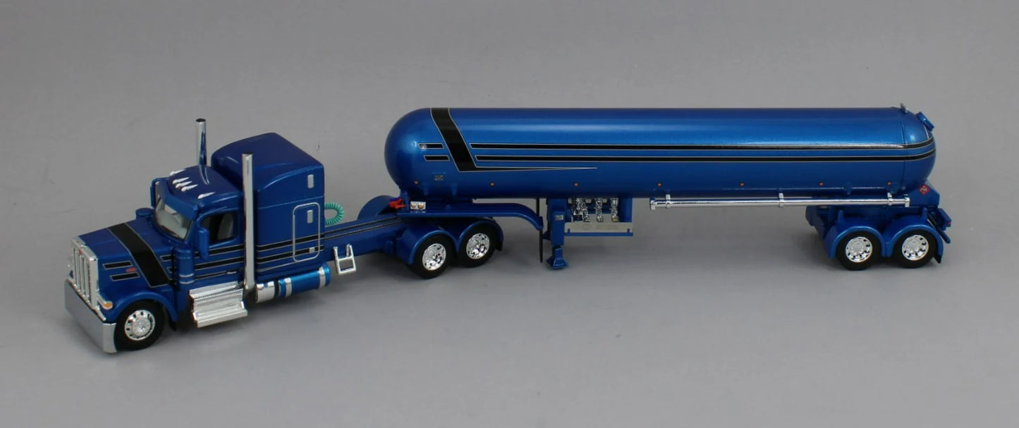 1:64 DCP blue and black Peterbilt 589 70" Midroof w/ Mississippi LP tanker
