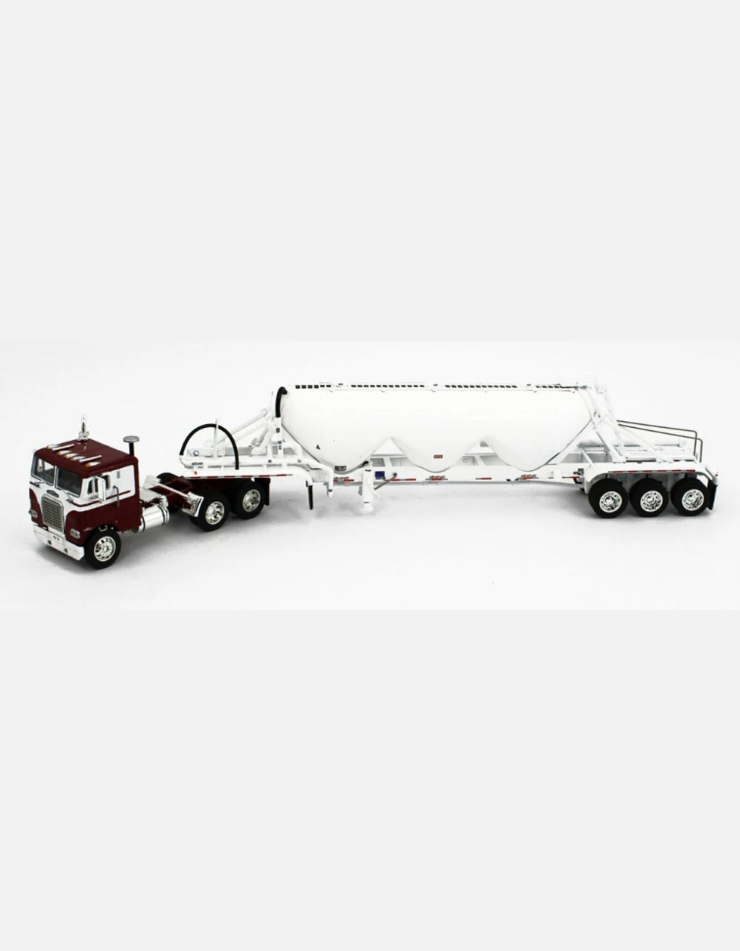 1:64 DCP Maroon and white Freightliner COE and Heil pneumatic 3 drop bulk trailer