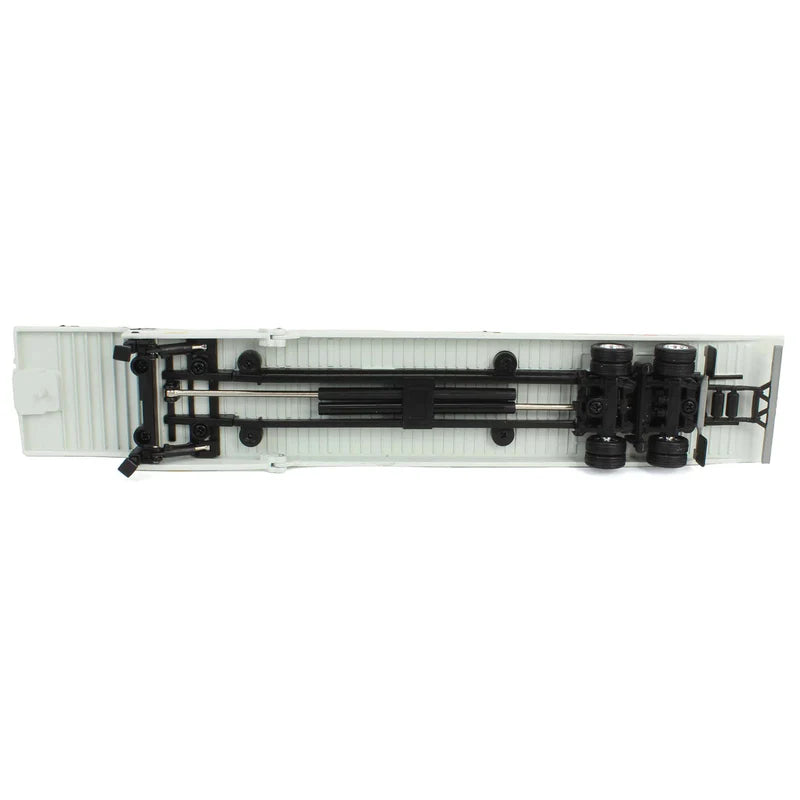 1:64 DCP White Peterbilt 389 with Landoll 440 Series Traveling Axle Trailer