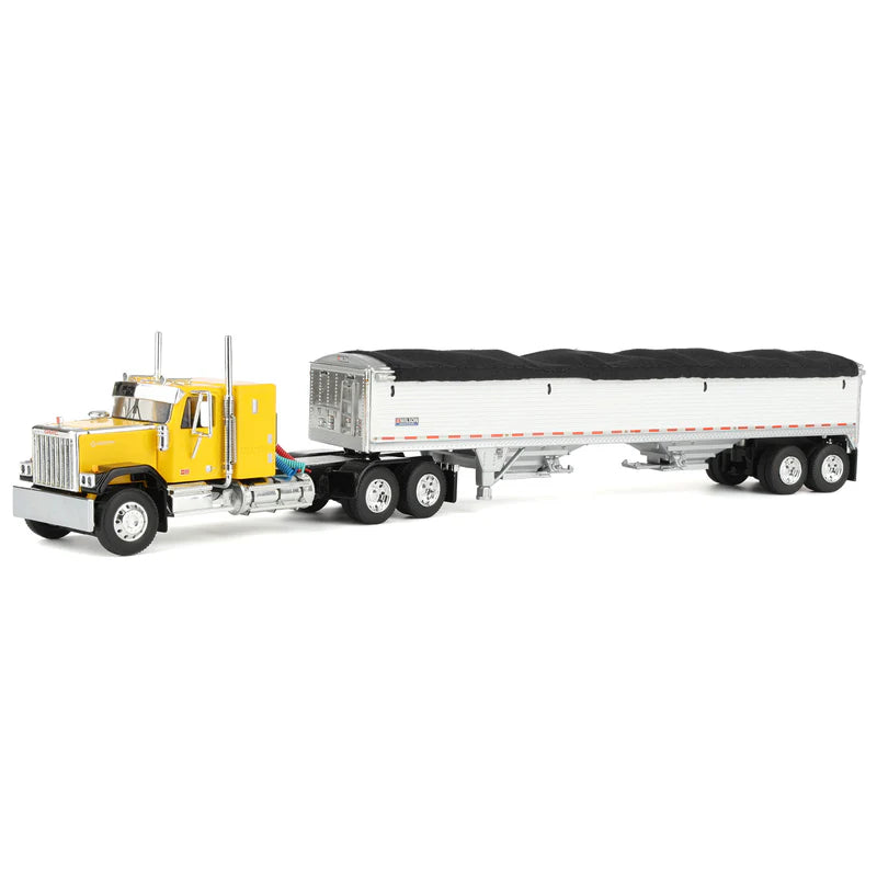 1:64 DCP Yellow and Black GMC General with 34" coffin sleeper and Wilson grain hopper