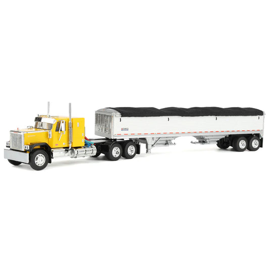 1:64 DCP Yellow and Black GMC General with 34" coffin sleeper and Wilson grain hopper