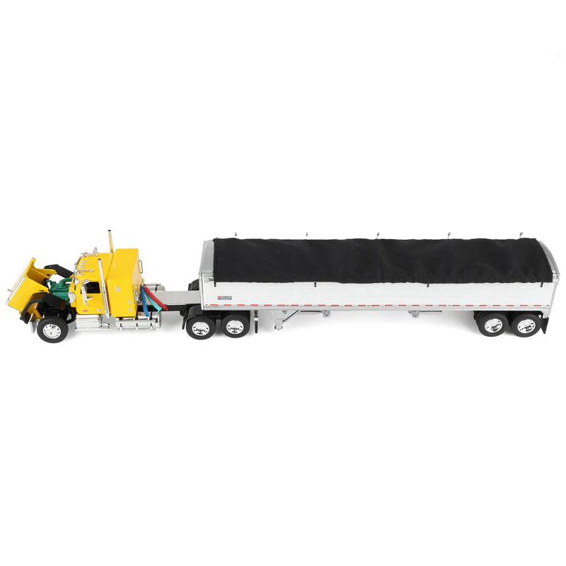 1:64 DCP Yellow and Black GMC General with 34" coffin sleeper and Wilson grain hopper