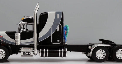 1:64 DCP Black Gray and Silver Peterbilt 379 with Wilson Spread Axle Cattle Trailer SCD