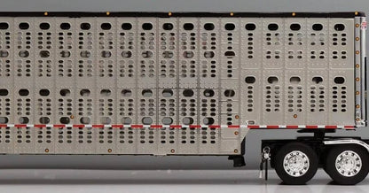 1:64 DCP Black Gray and Silver Peterbilt 379 with Wilson Spread Axle Cattle Trailer SCD