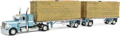 1:64 DCP Peterbilt Model 389 Semi Truck with 36 Flat Top Sleeper in Pacific Blue with 28.5' Utility Dual Hay Flatbed