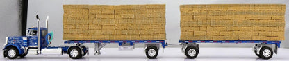1:64 DCP Blue Silver Flames Peterbilt 379 Single Axle Day Cab and Utility Dual 28.5' Flatbed Trailers with Hay Load