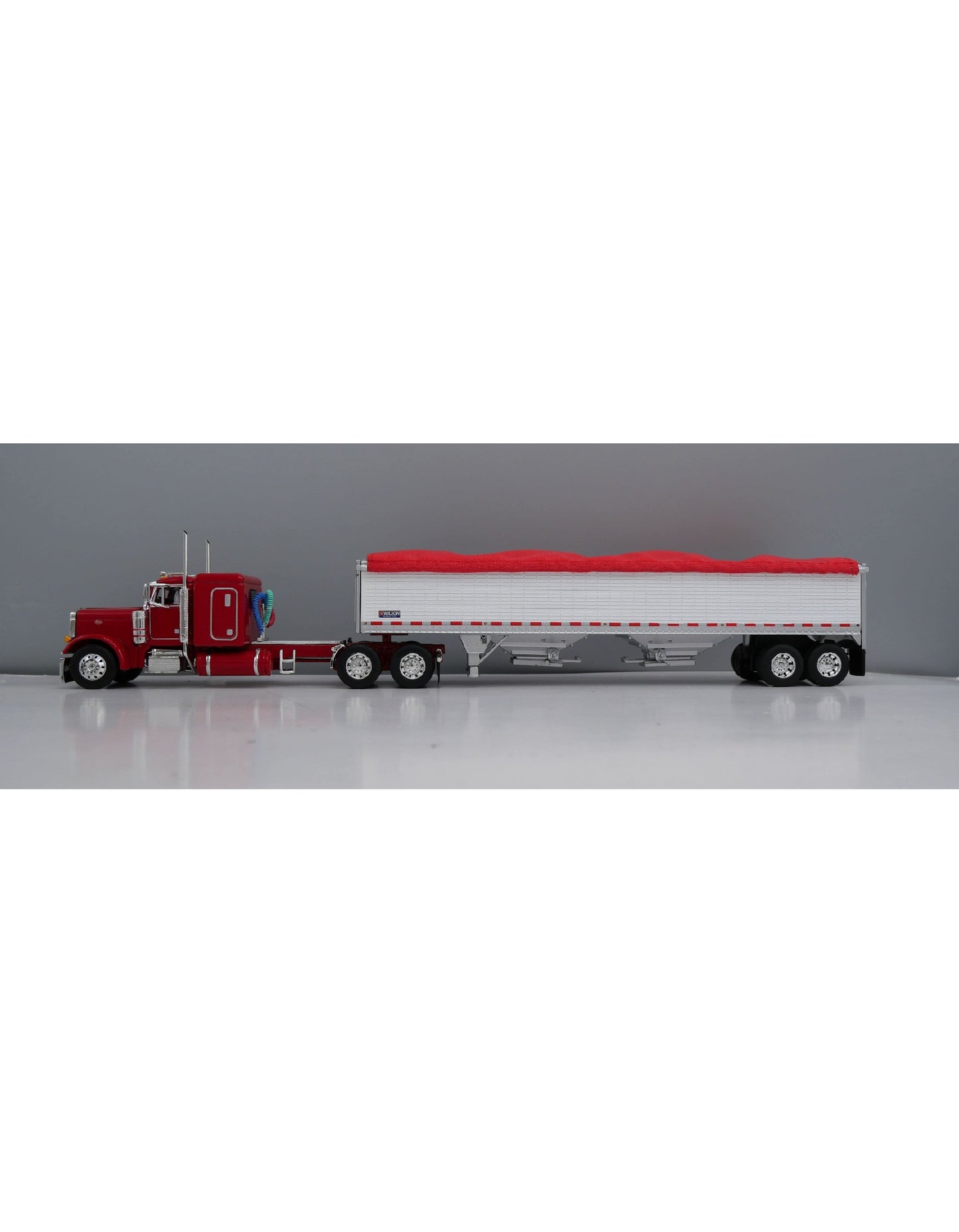 1:64 DCP Peterbilt 379 with 48" Flattop Sleeper and Wilson High Sided Grain Trailer, Red