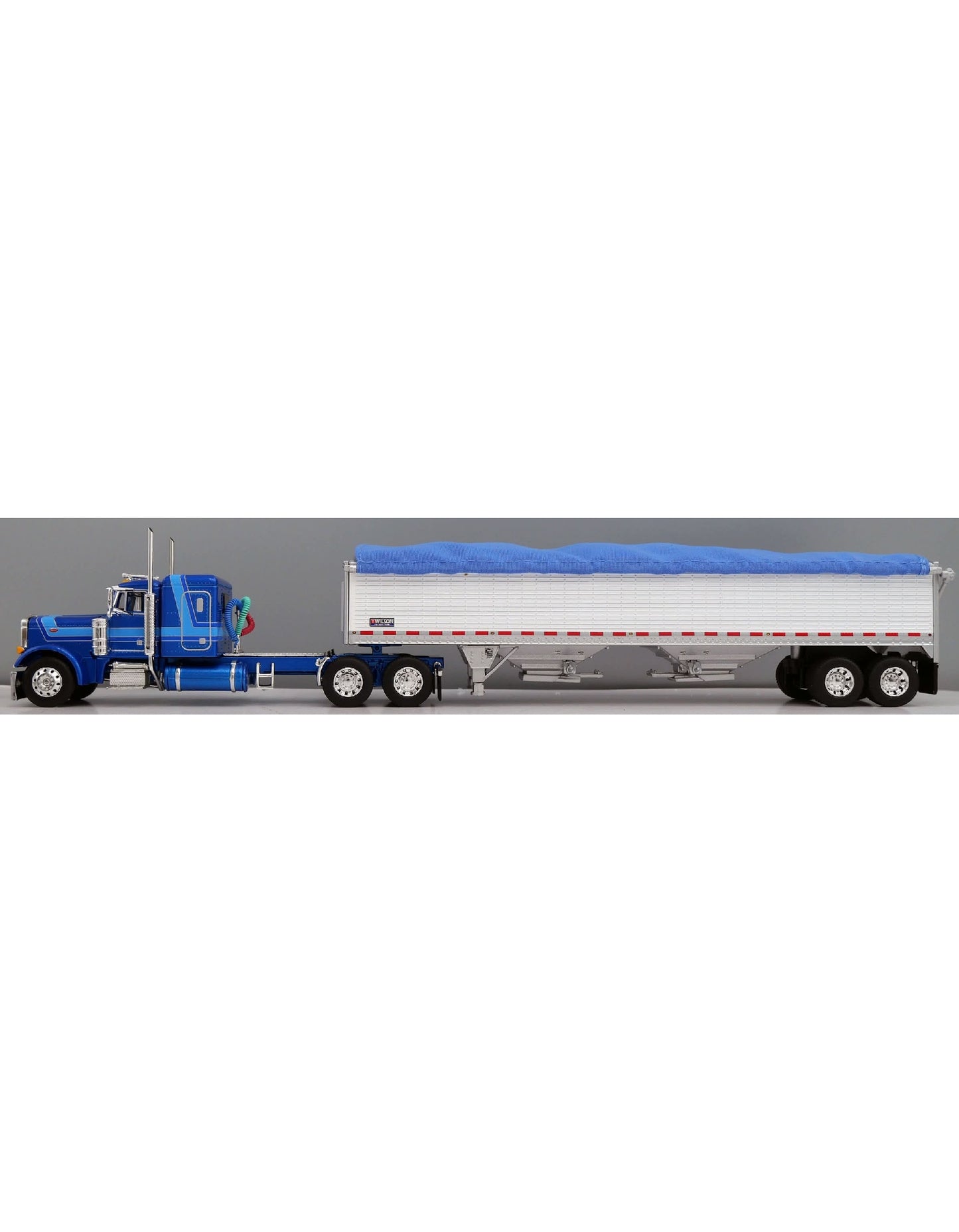 1:64 DCP Blue Peterbilt 379 Semi with White 43′ Wilson Pacesetter Grain Trailer