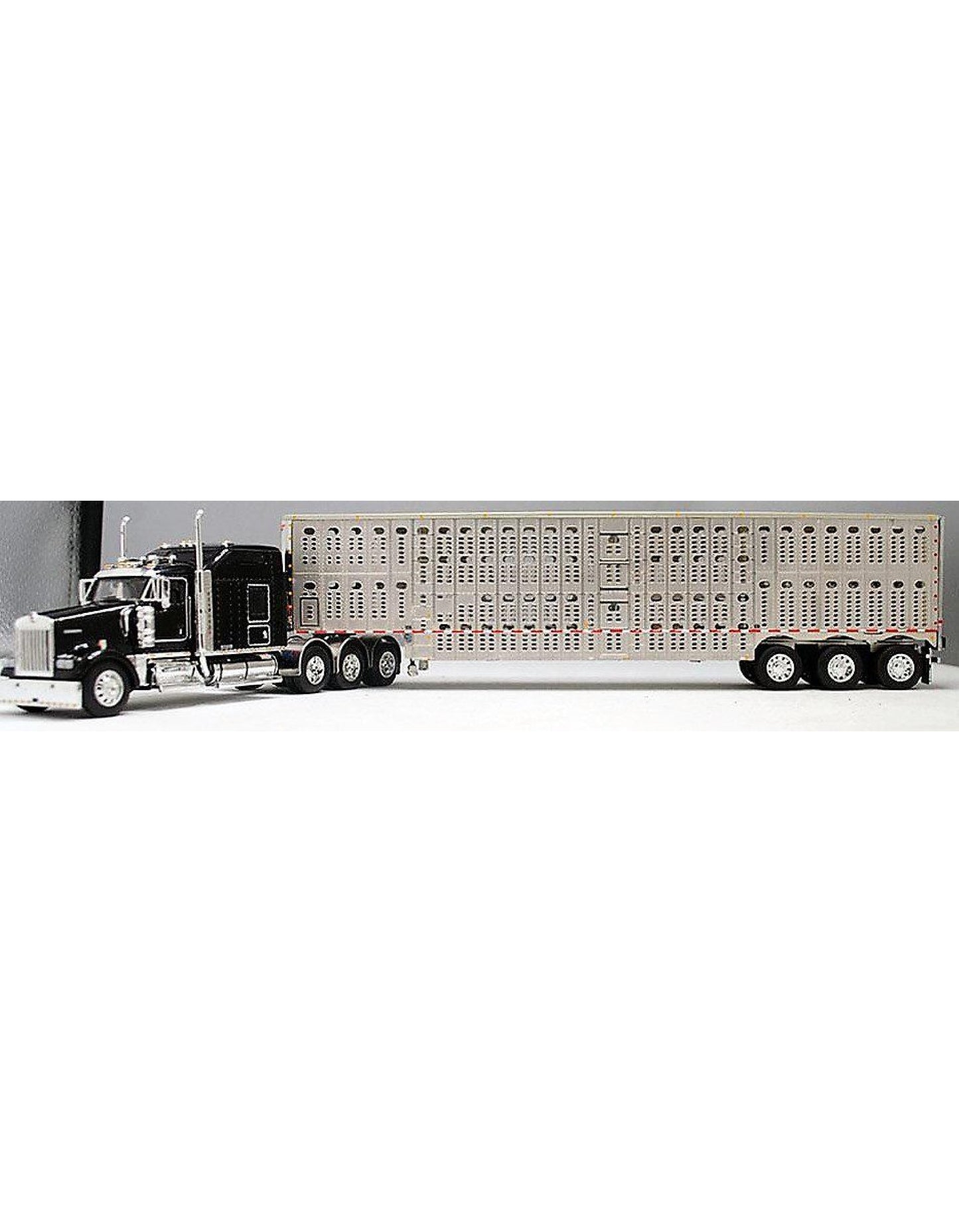 1:64 DCP Black Kenworth W900L 86" Studio Sleeper Tri-Axle Tractor Cab with a Tri-Axle Wilson Livestock Trailer with Chrome End and Sliver Roof