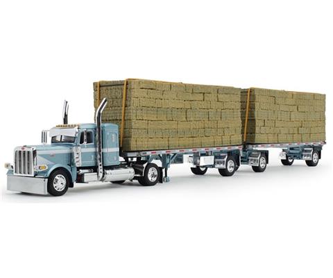 1:64 DCP Peterbilt Model 389 Semi Truck with 36 Flat Top Sleeper in Pacific Blue with 28.5' Utility Dual Hay Flatbed