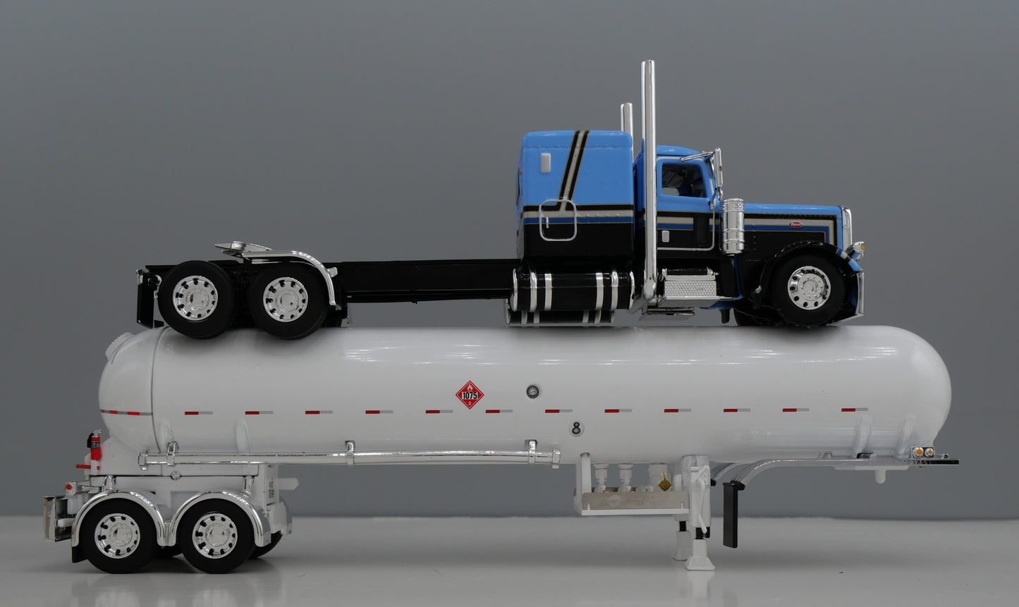 1:64 DCP Blue Black and Silver Peterbilt 389 63" w/ Anhydrous bottle