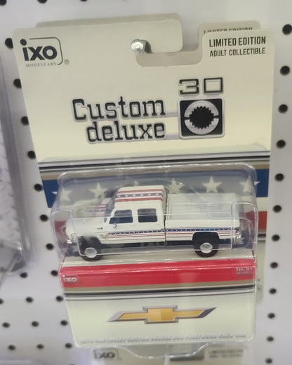 1:64 IXO 1976 Chevrolet Custom Deluxe K30 Fleetside - July 4th Exclusive