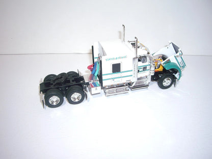 1:64 DCP White and Green V-Y Truckline Kenworth W900L 72" Aerocab Flattop sleeper and Wilson silver star tri axle livestock trailer