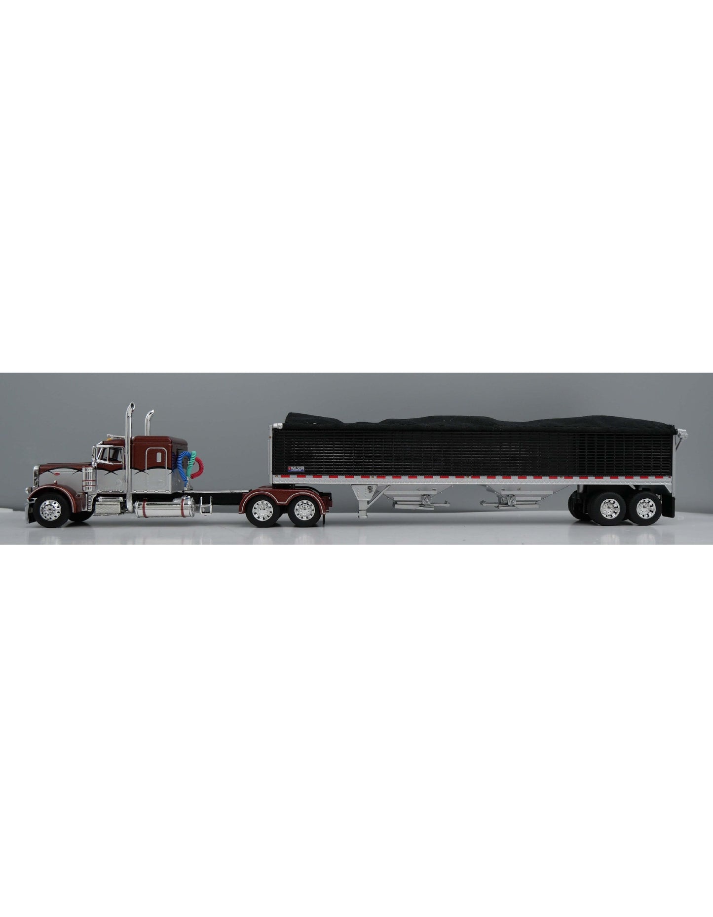 1:64 DCP Peterbilt 379 with 48" Flattop Sleeper and Wilson High Sided Grain Trailer, Bronze and Black barbed wire
