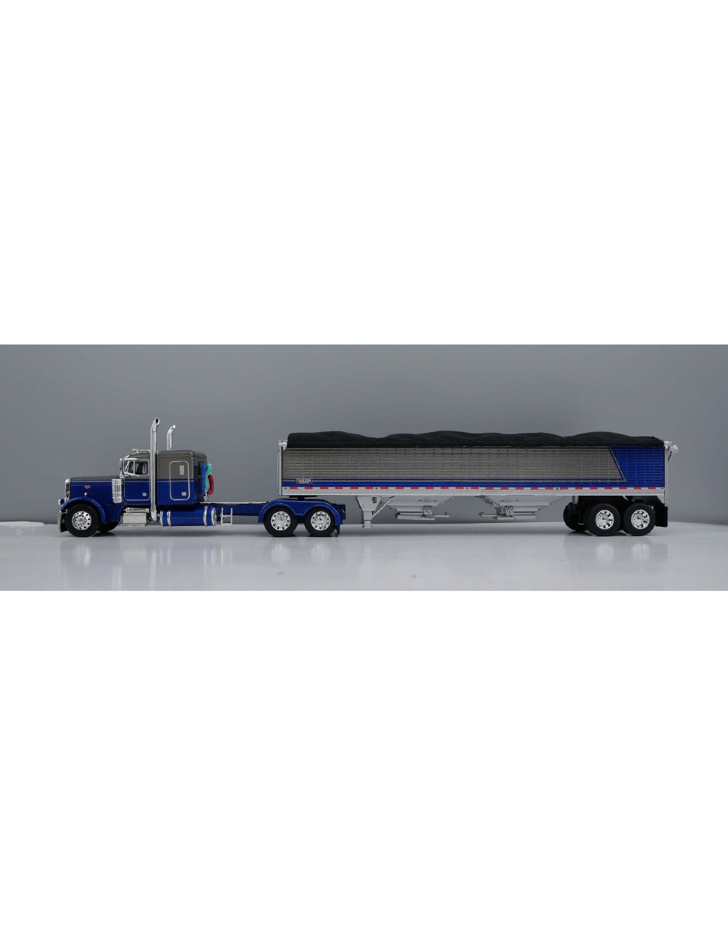 1:64 DCP Peterbilt 379 with 48" Flattop Sleeper and Wilson High Sided Grain Trailer, Blue and Silver